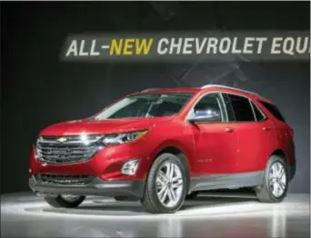  ?? STEVE FECHT — GENERAL MOTORS VIA AP ?? This photo provided by General Motors shows the 2018 Chevrolet Equinox compact SUV, Thursday in Chicago. While sales of its main competitor­s are rising, the aging Chevrolet Equinox compact SUV has taken a dramatic tumble so far this year in the...