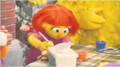  ??  ?? ‘Sesame Street’ is going to introduce a new muppet, Julia who has autism. • (Below) The building of Julia.