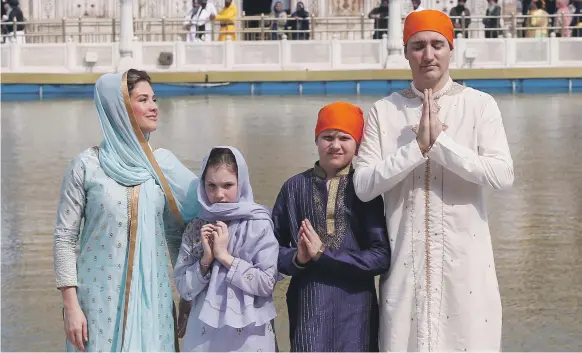  ?? Reuters ?? The Canadian Prime Minister, Justin Trudeau, his wife, Sophie Gregoire, daughter Ella Grace and son Xavier during their visit to the Golden temple in Amritsar