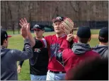  ?? MADDIE BOYD — RIDER ATHLETICS ?? Rider starting pitcher Dylan Heine is congratula­ted by teammates as he leaves the field at the end of an inning against Niagara during an NCAA baseball game on Friday afternoon at Sonny Pittaro Field in Lawrencevi­lle.