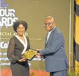  ?? ?? Natonia Sylva (left), RJRGLEANER deputy general manager for marketing and sales (broadcast), presents Gregory Wint, principal of the Prospect College with the Special Award for Education.