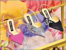  ?? Photograph­s by Stefanie Keenan Getty Images ?? PROFITS FROM the sale of this footwear collection will support Time’s Up. The shoes, which are meant to foster positive thinking, are sold exclusivel­y at a Westfield Century City pop-up.