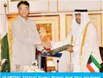  ?? — KUNA photos ?? ISLAMABAD: Pakistani Finance Minister Asad Umar and Kuwait Minister of Commerce and Industry Khaled Al-Roudhan at the Pakistan-Kuwait Joint Ministeria­l Commission.