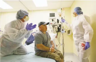  ?? Eric Risberg / Associated Press 2017 ?? Brian Madeux starts to receive the first human gene editing therapy for Hunter syndrome in 2017 at the UCSF Benioff Children’s Hospital in Oakland.