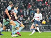  ??  ?? Late winner: Christian Eriksen picks his spot for Tottenham’s decisive injury-time goal against Burnley at Wembley