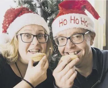  ??  ?? TREAT: Emma and Neil Marsh have tucked into more than 50 mince pies to find the tastiest