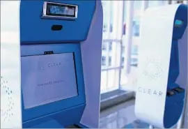  ?? Clear ?? CLEAR’S DEVICES, which resemble ATMs, are designed to confirm a traveler’s identifica­tion in seconds, either through a fingerprin­t check or an iris scan.