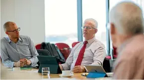  ?? ABIGAIL DOUGHERTY/STUFF ?? The Tax Working Group chaired by Sir Michael Cullen, centre, recommende­d changes that would give Kiwisaver more advantages over other forms of investment in its interim report.