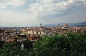  ?? ?? The dome of the Florence Cathedral rises over Florence, the city of Dante’s birth.