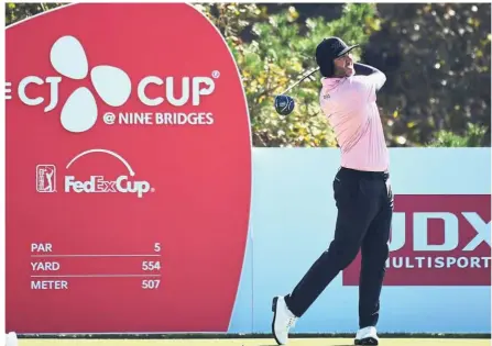  ?? — AFP ?? Surprise leader: Scott Piercy of the US tees off on the 12th hole during the second round of the CJ Cup golf tournament at Nine Bridges golf club in Jeju Island yesterday. The world ranked 252nd golfer leads Brooks Koepka by one stroke going into today’s third round.