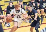  ?? JON LANGHAM/DAILY SOUTHTOWN ?? Lockport’s Ethan Gallagher drives the baseline against Andrew’s Zain Jubeh.