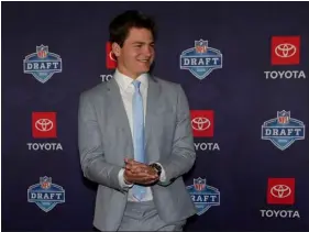  ?? CARLOS OSORIO — THE ASSOCIATED PRESS ?? North Carolina quarterbac­k Drake Maye poses on the red carpet ahead of the first round of the NFL Draft on Thursday, April 25, 2024, in Detroit.