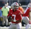  ?? JAY LAPRETE — THE ASSOCIATED PRESS ?? Ohio State quarterbac­k C.J. Stroud drops back to pass against Michigan during the first half of last Saturday’s game against Michigan in Columbus, Ohio.