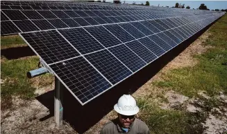  ?? Jon Shapley/Staff file photo ?? Solar panels are seen at the Blue Jay solar and storage plant in Iola. “We’ve been building solar at a pretty breakneck pace in the state,” said UT-Austin research scientist Joshua Rhodes.