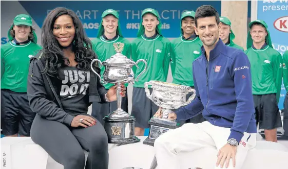  ??  ?? Defending champions Serena Williams and Novak Djokovic at yesterday’s draw.