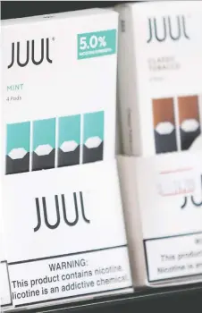  ?? ELIJAH NOUVELAGE/REUTERS ?? Juul Canada will temporaril­y stop making vaping pods with mango, cucumber, fruit and vanilla flavours. The feds are considerin­g more restrictio­ns on flavoured vapes.