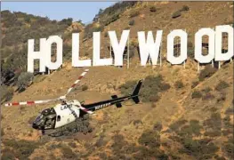  ?? THE HELICOPTER­S Al Seib Los Angeles Times ?? spend a disproport­ionate amount of time f lying over some lower-income neighborho­ods regardless of their crime rates, f light data show.