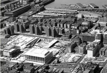  ?? ?? Above: The constructi­on of New York City’s Lincoln Center in what was known as San Juan Hill, where West Side Story takes place in 1957.