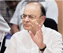  ?? PHOTO: PTI ?? Arun Jaitley, Union minister for finance and corporate affairs, chairs the 17th GST Council meeting at Vigyan Bhavan in New Delhi on Sunday