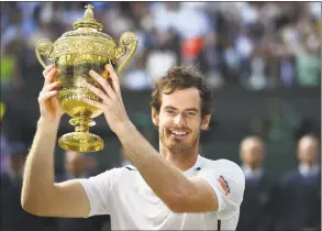  ?? GLYN KIRK / AFP / Getty Images ?? Andy Murray poses with the winner’s trophy after his men’s singles victory over Milos Raonic at the 2016 Wimbledon Championsh­ips. A tearful Murray on Friday announced he would likely retire this year due to severe pain from a hip injury, saying this week’s Australian Open could be the last tournament of a glittering career.