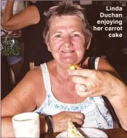  ??  ?? Linda Duchan enjoying her carrot cake