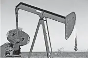  ?? [PHOTO BY DANIEL ACKER, BLOOMBERG] ?? Pumpjacks operate on oil wells in the Permian Basin near Crane, Texas, on March 2.