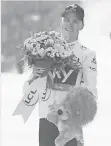  ?? STEPHANE MANTEY, AP ?? Chris Froome thanked his wife and infant son during his speech.