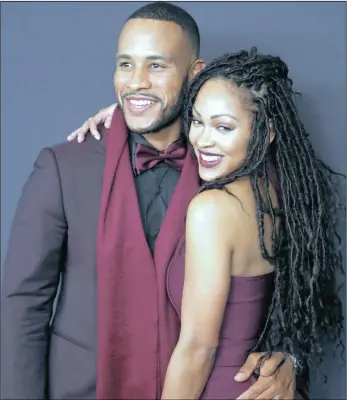  ??  ?? HOLDING TIGHT: Writer DeVon Franklin, left, and actress Meagan Good were among celebritie­s who attended the Golden Globes after-party event in Beverly Hills, California, yesterday.