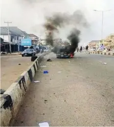  ?? PHOTO: TIMOTHY AGBOR ?? Burnt car belonging to a union member along Ayetoro area of Osogbo… yesterday