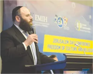  ?? (Yoni Rykner) ?? FOUNDER AND chairman of the European Jewish Associatio­n Rabbi Menachem Margolin addresses the opening of the EJA’s annual conference in Brussels yesterday.