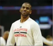  ?? RYAN KANG — THE ASSOCIATED PRESS FILE ?? Clippers guard Chris Paul warms up before a game in Los Angeles.