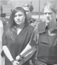  ??  ?? Cheyann Crystal Peeteetuce, shown leaving court on Friday, was sentenced to six years in prison in the deaths of Sarah
Wensley and James (J.P.) Haughey.