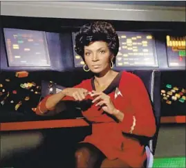  ?? CBS Photo Archive via Getty Images ?? NICHELLE NICHOLS on the original “Star Trek” as Lt. Uhura, one of the first regular cast roles on TV for a black woman that was not a servant or singer.