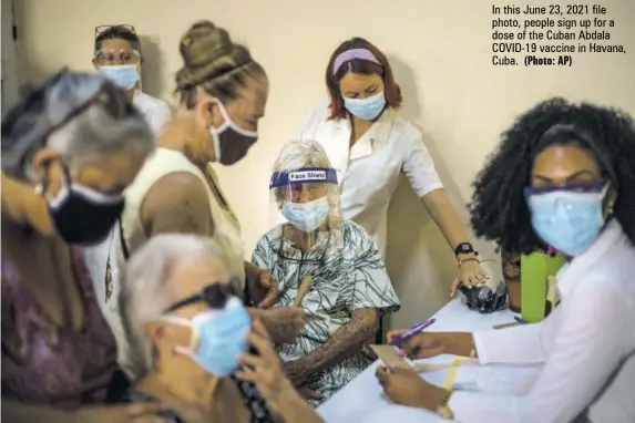  ?? (Photo: AP) ?? In this June 23, 2021 file photo, people sign up for a dose of the Cuban Abdala COVID-19 vaccine in Havana, Cuba.