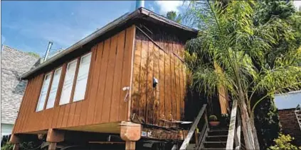  ?? Google Earth ?? AT A MODEST $929,000, Beverly Hills’ cheapest home for sale has two bedrooms and a deck.