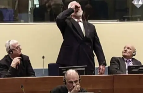  ??  ?? Former Bosnian Croat military leader Slobodan Praljak shouted, “I am not a war criminal!” after a UN judge backed his conviction for war crimes.