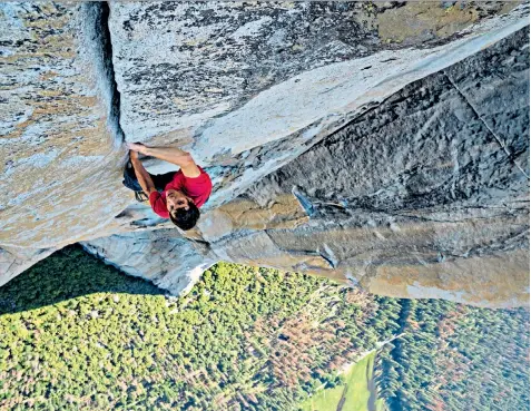  ??  ?? Only way is up: Alex Honnold making the first free solo ascent of El Capitan in 2017. Below, with girlfriend Sanni Mccandless