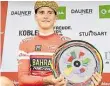  ?? DPA-BILD: KNSTLE ?? Mit dem Siegertell­er: Matej Mohoric