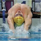  ?? ?? GOOD START: Pieter Coetzé in the men’s 50m backstroke at the national championsh­ips at the Newton Park Swimming Pool yesterday