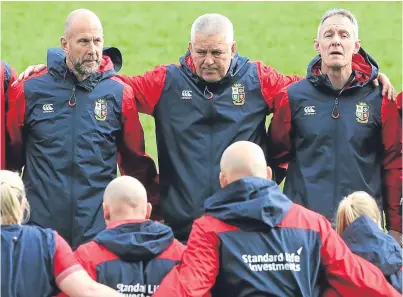  ?? Picture: Getty Images. ?? Warren Gatland, centre, joins his coaching staff in a minute’s silence in tribute to the victims of the London terror attacks.