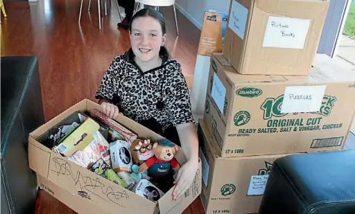  ?? DENISE PIPER/STUFF ?? Gabriella Dew, 10, is proud her schoolmate­s donated many items for the children’s ward.