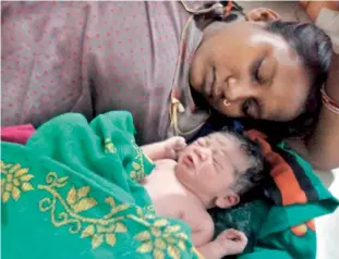  ??  ?? Photo of a woman and her newborn baby tweeted by Bhadrak Collector Gyana Das.