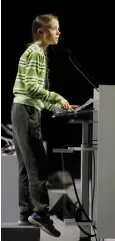  ??  ?? ECO-WARRIOR: Swedish climate activist Greta Thunberg stands on a box to reach the microphone while addressing a meeting at the UN climate conference in Madrid, Spain, last Wednesday