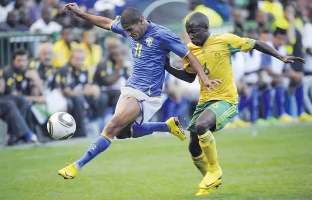  ?? Picture: AFP ?? BACK IN THE DAY. Ronald Mohlaka (right) is seen here playing for the South African Under-20s against Brazil in 2010.