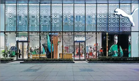  ?? PHOTOS PROVIDED TO CHINA DAILY ?? Above: PUMA’s new store format creates a better consumer experience space. Left: PUMA launches special edition shoes to celebrate F1’s return to China.