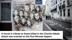  ??  ?? A mural in tribute to those killed in the Charlie Hebdo attack was erected on the Rue Nicolas-Appert.