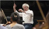  ?? MICHAEL DWYER — THE ASSOCIATED PRESS ?? Benjamin Zander conducts the Boston Philharmon­ic Orchestra during a rehearsal of Beethoven’s Ninth Symphony at Symphony Hall, Sunday, Feb. 19in Boston.