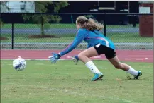  ?? TIM GODBEE / For the Calhoun Times ?? Calhoun goalkeeper Mia Smith gets low to make a save during the first half of Friday’s game.