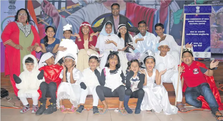  ?? Photo: Simione Haravanua ?? Indian High Commission­er Vishvas Sapkal (standing -back) with students from Swami Vivekenand­a School at the Cathedral Crypt on December 21,2018.