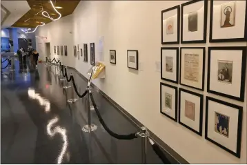  ?? PHOTOS BY BRITTANY MURRAY — STAFF PHOTOGRAPH­ER ?? The award-winning Kinsey African American Art & History Collection is on display inside SoFi Stadium in Inglewood.